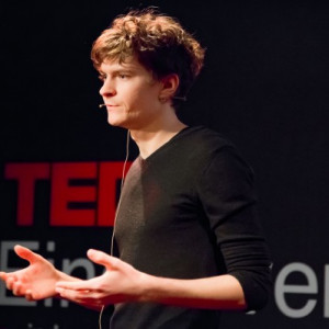Nikita Voloboev giving a TED talk